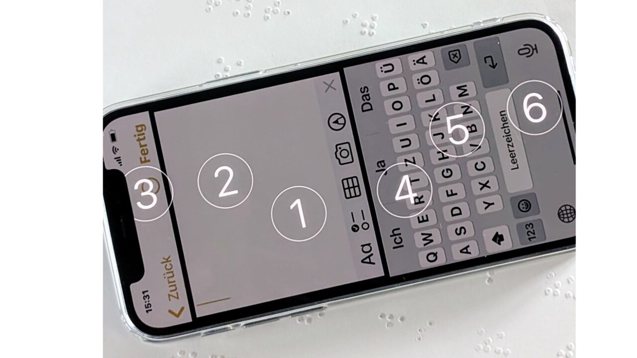 iPhone mit Brailletastatur auf dem Bildschirm